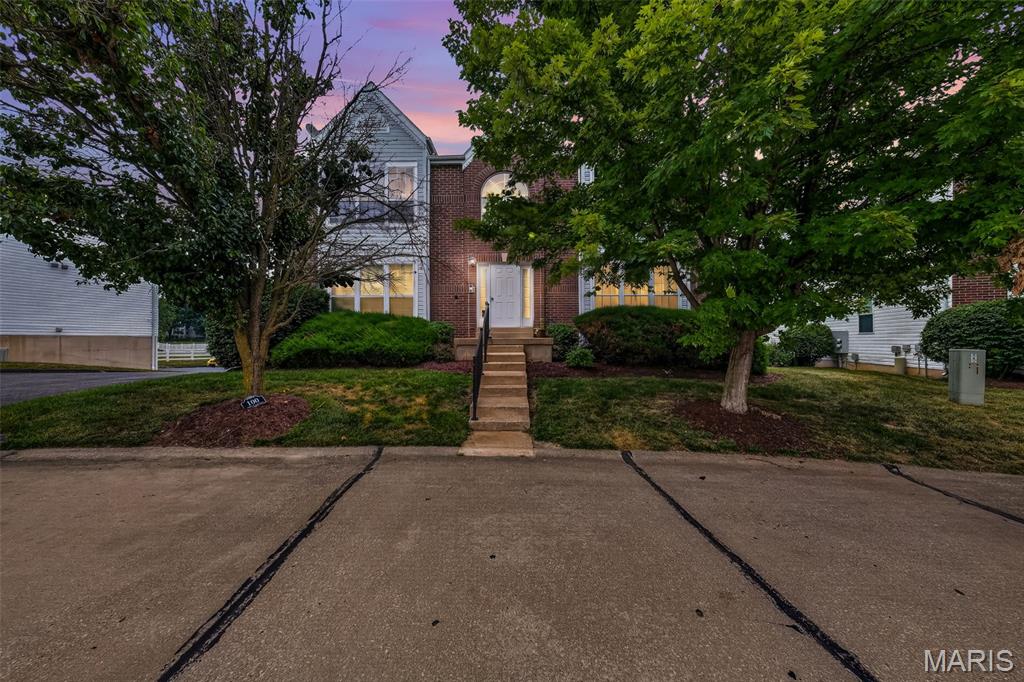 Welcome home to this beautiful ground-floor 2-bedroom, 2-bath, 1 car garage condo in the desirable WingHaven area! This open-concept floor plan offers comfortable, low-maintenance living with abundant natural light, large windows, and a cozy electric fireplace in the spacious great room.

The kitchen opens seamlessly to the living area and features stainless steel appliances, a pantry, and generous counter space—perfect for everyday living and entertaining.

The spacious primary suite includes a walk-in closet, private access to the deck, and an en-suite bath with double sinks. A second generously sized bedroom and full hall bath provide plenty of space for family, guests, or a home office. Conveniently located in the hallway between the two bedrooms, the main-floor laundry adds ease and functionality to everyday living.

Additional highlights include a one-car garage and an oversized private storage room in the lower level, offering exceptional storage rarely found in condo living.

Conveniently located with easy access to Highways 364 and 40, you're just minutes from shopping, restaurants, parks, and everyday conveniences. Plus, the elementary school is within walking distance.

Enjoy maintenance-free living in one of O'Fallon's most desirable communities—this move-in ready condo is one you won't want to miss!