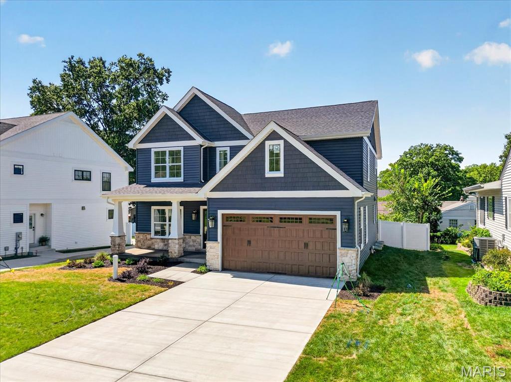 Just finished beginning of September! New Construction, 2-story, 5 bedroom, 3.5 bath by Schindler Homes LLC in Kirkwood. This beautiful home features 9' first floor ceilings, hardwood flooring entire 1st floor, wainscot trim in den, stainless steel Kitchen-Aid appliances with chimney hood, 42 inch shaker kitchen wall cabinets with soft close drawers and doors, pull out trash cabinet, under cabinet lighting with light rail, walk-in pantry, quartz countertops, mudroom on 1st floor with custom lockers, fireplace in family room, luxurious master bath with double sinks, Moen plumbing fixtures, separate tub and shower, his and hers large walk-in closets, large 2nd floor laundry with cabinets/granite folding counter, 50 gallon hot water heater, cased out windows, tall pour and finished lower level, and architectural grade shingles. Will have fully sodded yard and professionally landscaped. Great location, convenient to highways, parks, and shopping.