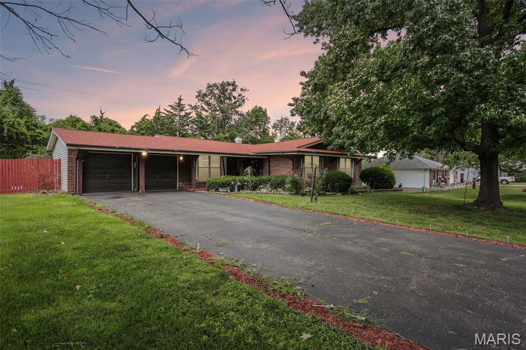 Opportunity awaits in this all-brick ranch nestled in the highly sought-after Orchard Lakes subdivision and award-winning Parkway School District! The heavy lifting has already been done with a 4-year-old roof and brand-new HVAC system, water heater, electrical panel, and French front entry doors, leaving the fun part—making it your own.

Offering 3 bedrooms, 2 full baths, and approximately 1,726 square feet, this home combines major updates with endless potential to add your own personal style. Gorgeous hardwood floors flow through much of the home, and the sellers are offering a $5,000 credit, giving buyers the flexibility to refinish or replace the bedroom flooring to their taste.

One of the home's standout features is the full walkout basement—a rare find in this area and ready to be transformed into additional living space, a recreation room, home office, fitness area, workshop, or whatever best suits your lifestyle.

Situated in a charming, established Creve Coeur neighborhood, you'll enjoy convenient access to Trader Joe's, ALDI, shopping, dining, parks, hospitals, and major highways including I-270 and Highway 364. Whether you're looking for a home with updated major systems, room to build equity through cosmetic improvements, or the opportunity to create your dream space in one of West St. Louis County's most desirable locations, this property is one you won't want to miss!