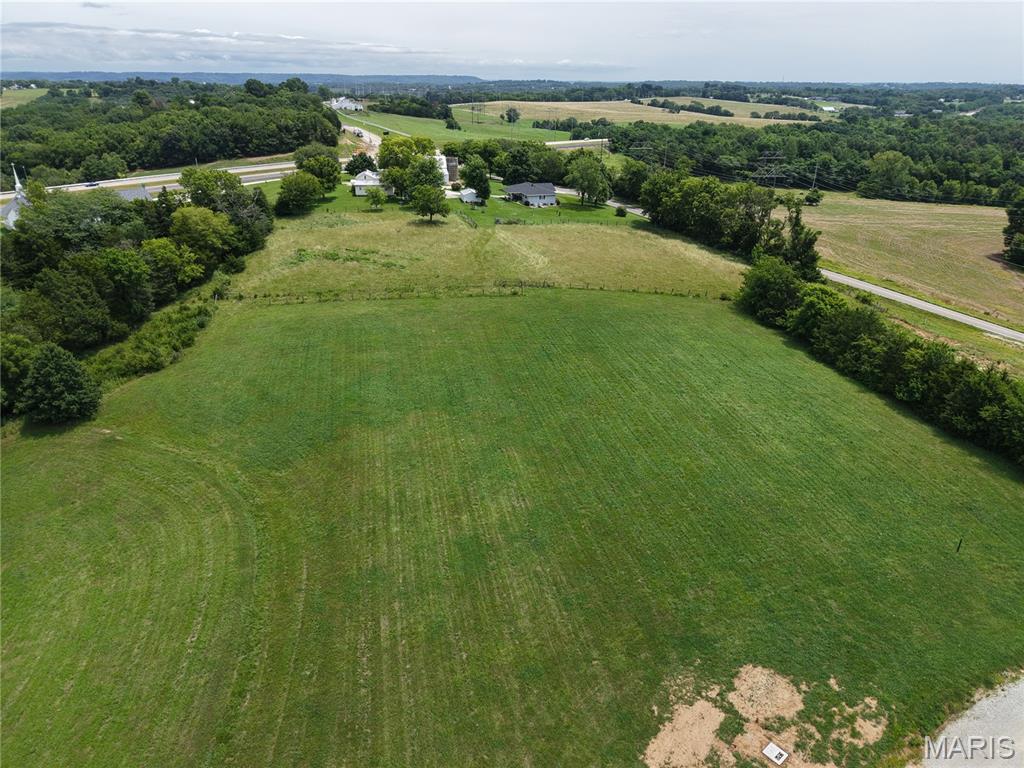 This 3.92-acre property is part of a 9-lot custom home development in a serene rural setting just minutes from Highway 44 and Washington, MO. 
It features excellent, level hilltop distant views with natural walk-out building sites.  A new concrete entrance has been installed for easy access and the subdivision road will be paved at the HOA's choice. The developer will escrow $7,000.00 directly into the HOA Account with every lot sale. All lot Corners are clearly marked in the field and subject to restrictions. Unlike tract home subdivisions, this small custom development will command much higher future resale values.   Become part of the Ridgewood Family today.