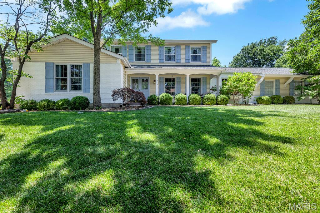 Location! Updated! Move-In Ready!

Beautiful 5-bedroom, 3.5-bath, two-story home offering plenty of space for families of any size. The first floor features a spacious main-floor primary suite, formal dining room, eat-in kitchen, inviting family room with a wood-burning fireplace, bright four-season room, and an additional living room, providing flexible space for everyday living and entertaining.

Upstairs, you'll find three generously sized bedrooms, a full bathroom, and convenient second-floor laundry. The finished lower level adds even more living space with a fifth bedroom and an additional full bathroom—perfect for guests, a home office, or multi-generational living.

Step outside to enjoy the fenced, mostly level backyard, rear-entry garage, and patio area. Nestled in a quiet neighborhood, this home offers easy access to Clayton and Highway 141, along with abundant shopping, dining, and everyday conveniences nearby. A fantastic location and a home that's truly move-in ready!