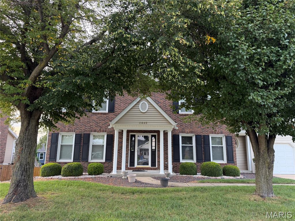 Spacious 5-Bedroom Two-Story in a Beautiful St. Charles Community!

Welcome home to this impressive two-story offering nearly 4,000 sq. ft. of living space, 5 bedrooms, 3.5 baths, and room for everyone! Located in a beautiful St. Charles development with sidewalks throughout, this home combines a fantastic location, generous living spaces, thoughtful updates, and wonderful indoor/outdoor entertaining areas.

Step inside and immediately appreciate the 10-foot ceilings on both the main and second floors, creating a bright, open and spacious feel throughout the home. The main level features a large updated eat-in kitchen with beautiful newer cabinetry, solid-surface countertops, stainless steel appliances, and luxury vinyl plank flooring. The kitchen opens to the family room featuring a cozy wood-burning fireplace, while French doors from the breakfast area lead to the expansive maintenance-free deck spanning much of the back of the home.

A separate formal dining room is perfect for holidays and entertaining, while the formal living room/den provides flexible space for a home office or additional sitting area. A beautiful bay window overlooks the deck and backyard. Main-floor laundry and a convenient half bath complete this level.

Upstairs you’ll find plenty of room for a large household with five spacious bedrooms and two full baths. Three of the five bedrooms feature large walk-in closets! The primary suite offers a coffered ceiling, large walk-in closet, and private bath with double vanity, sunken tub, stand-up shower, linen closet, and a large skylight providing an abundance of natural light. The second full bath upstairs has also been recently updated.

The finished lower level adds even more living and entertaining space with a family room, game room, full bath with stand-up shower, and additional sleeping area. The pool table is negotiable and could remain with the home. A full egress window and double walkout provide plenty of natural light and easy access to the beautiful covered patio.

Outside, enjoy the expansive deck, covered patio, and a backyard accented by several mature trees, including a gorgeous weeping willow that adds character and charm to the setting.

This spacious home has been professionally cleaned and is ready for its new owners. With nearly 4,000 sq. ft., five bedrooms, multiple living and entertaining spaces, a finished walkout lower level, and a fantastic St. Charles location, this one offers an incredible amount of space and versatility!