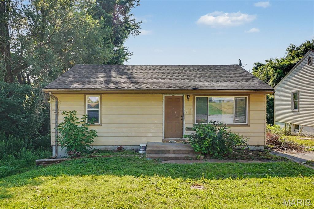 Whether your strategy is a flip, BRRRR, long-term rental, or creating instant equity as an owner-occupant, this partially renovated home offers a valuable head start that can shorten renovation timelines and reduce carrying costs. Owner-occupants may also wish to explore renovation financing options, such as FHA 203(k) or Fannie Mae HomeStyle® loans, allowing qualified buyers to finance both the purchase and eligible renovation costs in a single mortgage. Rather than spending valuable time on demolition and cleanup, the next owner can focus on rebuilding, selecting finishes, and bringing the renovation to completion more quickly. By shortening the early phases of construction, this property offers the opportunity to reduce carrying costs and accelerate the path to rental income, resale, or long-term equity.

The remaining renovation work is primarily focused on installing a new kitchen, completing the bathroom remodel, verifying and completing any remaining mechanical work, updating lighting and interior finishes, and adding the final details that bring the project across the finish line. Much of the labor-intensive demolition has already been completed and many of the finishes, including fresh paint throughout most of the main level, allowing the next owner to spend more time creating value instead of preparing for construction.

Inside, the spacious living room is filled with natural light from an oversized picture window, while hardwood floors extend throughout much of the main level and appear well-preserved. The generously sized bedrooms provide comfortable layouts with ample closet space, creating an excellent foundation for a modern renovation.

The kitchen has already been removed and prepared for a complete redesign, while the bathroom has been taken down to the studs, eliminating much of the labor-intensive demolition required before construction can begin. Proper green board drywall is ready for the bathroom finishes and can be left in the home if requested as an inclusion. Owner also owns gently-used kitchen cabinets from another home that could be included in the purchase if desired; ask agent for details. The full basement offers excellent ceiling height, abundant storage, workshop space, and future finishing potential, providing even more opportunities to add value.

The sewer lateral was professionally hydro-jetted in late 2025, and electrical improvements appear to be underway. With much of the heavy lifting already completed, the next owner can devote more time and resources to the improvements that generate the greatest return instead of the earliest stages of demolition and deferred maintenance.

Outside, the home features a deep driveway, mature trees that create a private backyard setting, and generous outdoor space. Conveniently located just 0.2 miles from MetroBus service, the property also offers quick access to I-270, Chambers Road, and Lewis & Clark Boulevard, placing Christian Hospital, UMSL, Boeing, Lambert-St. Louis International Airport, and the Hazelwood and Earth City employment corridors within an easy commute. The combination of public transportation, highway accessibility, and nearby employment centers supports strong long-term rental demand while providing convenience for future owner-occupants.

Selected as part of the Penthouse Restoration Collection for its exceptional opportunity, untapped potential, and distinctive character, this home invites investors, renovators, and future homeowners to create lasting value through thoughtful restoration, strategic renovation, and inspired design.