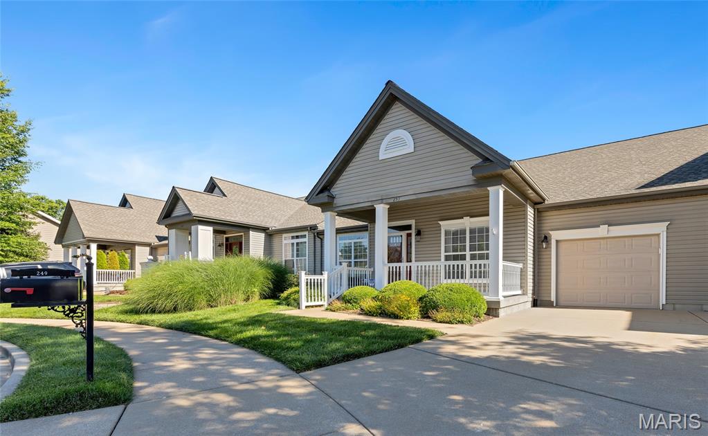 Experience carefree living in the sought-after Meadows of Wildwood, a premier active adult community designed for those 55 and better. This beautifully maintained ranch villa offers a spacious, flowing layout that connects the main living areas, creating an open, welcoming space. The well-appointed kitchen features stainless steel appliances, granite countertops, a decorative tile backsplash, abundant custom cabinetry with convenient pull-out shelving, and a large center island. The adjoining great room is open and airy, with a gas fireplace, vaulted ceiling and beautiful wood flooring. The private master suite includes a generous walk-in closet and an updated bath. A second bedroom, full bathroom and a charming screened porch complete the main level. The finished lower level expands the living space with a large recreation and dining area, plus a private guest suite featuring its own bedroom and full bath. Recent improvements include luxury vinyl plank flooring in the lower level, new carpeting on the stairs, fresh paint throughout much of the home, including trim and doors, and major system updates since 2021 including the HVAC system, water heater, refrigerator, oven, dishwasher, garbage disposal, washer, and dryer. Additional enhancements include a new roof installed in 2025, a freshly cleaned screened porch ceiling with new fan, and a newly painted garage. Make this stunning home yours today!
