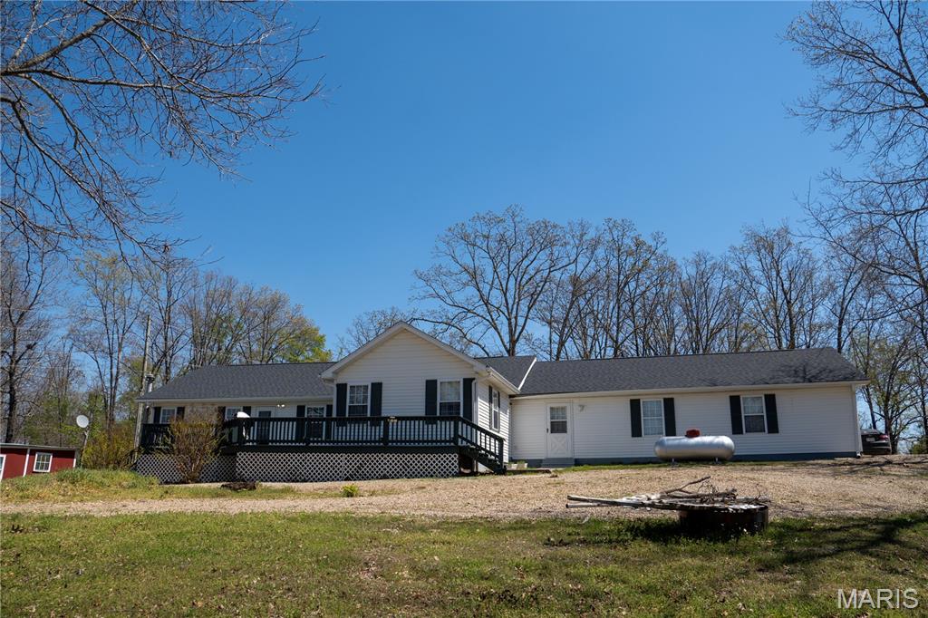 Set on 38 scenic acres in Grassy, Missouri, this beautifully updated 1,676 square foot home offers the perfect blend of comfort, privacy, and outdoor recreation. The home features a spacious layout with large bedrooms, an expansive living room, and is well-finished throughout with several updates.

Recent upgrades include a new roof, new septic system, fresh flooring, new paint, and numerous additional improvements throughout the home. Central heat and air ensure year-round comfort, while the exterior wood stove provides an alternative backup source of heat.

Step outside and you'll find a property that is truly catered for outdoor enthusiasts. This tract has great opportunities for deer and turkey hunting, a stocked pond for fishing, and direct private access to several hundred acres of Castor River Conservation Area - perfect for hunting, hiking, and exploring. Located less than three miles from the Castor River and just a short drive to Marble Hill, this property combines rural seclusion with convenient access to nearby amenities.

Whether you're looking for a full-time residence, hunting retreat, or recreational getaway, this property is a rare opportunity to own a versatile piece of Southeast Missouri land.