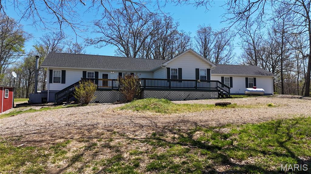 Set on 38 scenic acres in Grassy, Missouri, this beautifully updated 1,676 square foot home offers the perfect blend of comfort, privacy, and outdoor recreation. The home features a spacious layout with large bedrooms, an expansive living room, and is well-finished throughout with several updates.

Recent upgrades include a new roof, new septic system, fresh flooring, new paint, and numerous additional improvements throughout the home. Central heat and air ensure year-round comfort, while the exterior wood stove provides an alternative backup source of heat.

Step outside and you'll find a property that is truly catered for outdoor enthusiasts. This tract has great opportunities for deer and turkey hunting, a stocked pond for fishing, and direct private access to several hundred acres of Castor River Conservation Area - perfect for hunting, hiking, and exploring. Located less than three miles from the Castor River and just a short drive to Marble Hill, this property combines rural seclusion with convenient access to nearby amenities.

Whether you're looking for a full-time residence, hunting retreat, or recreational getaway, this property is a rare opportunity to own a versatile piece of Southeast Missouri land.