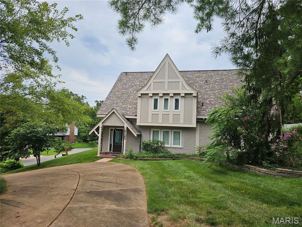 Welcome to this exquisite Tudor-style masterpiece in the highly sought-after Crystal Lake Park neighborhood!

Where timeless architectural charm meets modern luxury, this stunning home boasts over 3,800 sq. ft. of meticulously designed, above-grade living space. Featuring 4 spacious bedrooms and 3.5 beautifully appointed bathrooms, the home is engineered for comfort and style. Warm up by one of the three classic fireplaces featured in the formal living room, cozy family room, and versatile den (perfect for a private library or home office). Everyday convenience is elevated by a spacious main-floor laundry room and an expansive recreation room.

Step outside into your own private backyard oasis, complete with a high-end outdoor kitchen ready for summer entertaining, and a picturesque, tranquil pond adorned with water lilies.

Unbeatable Location: Located in the award-winning Ladue School District (Conway Elementary), this home offers a peaceful, retreat-like setting while keeping you moments away from the best shopping, dining, and parks. Experience the perfect blend of space, sophistication, and community—schedule your private tour today!