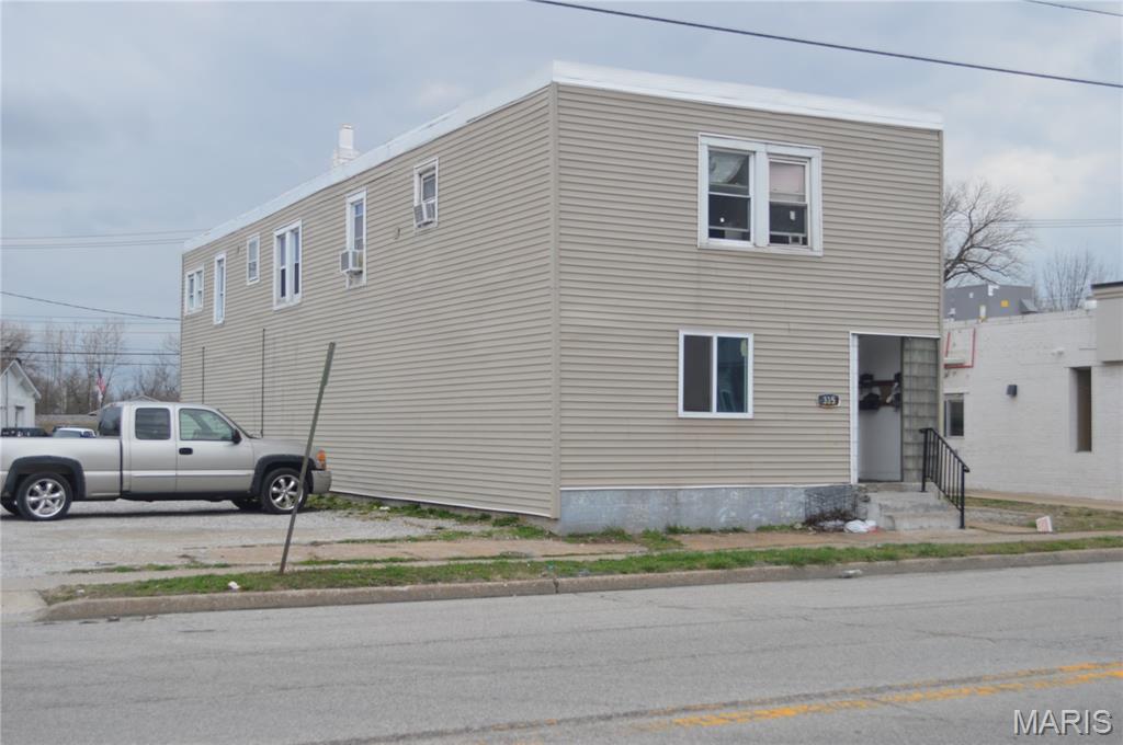 Excellent investment opportunity in East Alton! This 4-unit multi-family property consists of three 1-bedroom apartments and one 3-bedroom apartment, offering a desirable unit mix for a variety of tenants. The property is currently producing $3,000 per month in rental income, making it a strong cash-flow opportunity for investors. Convenient location near local amenities, shopping, dining, and major thoroughfares enhances tenant accessibility and long-term rental appeal. Add this income-producing property to your portfolio today.

Seller is motivated and is selling this property to purchase a different property.

Agent owned.