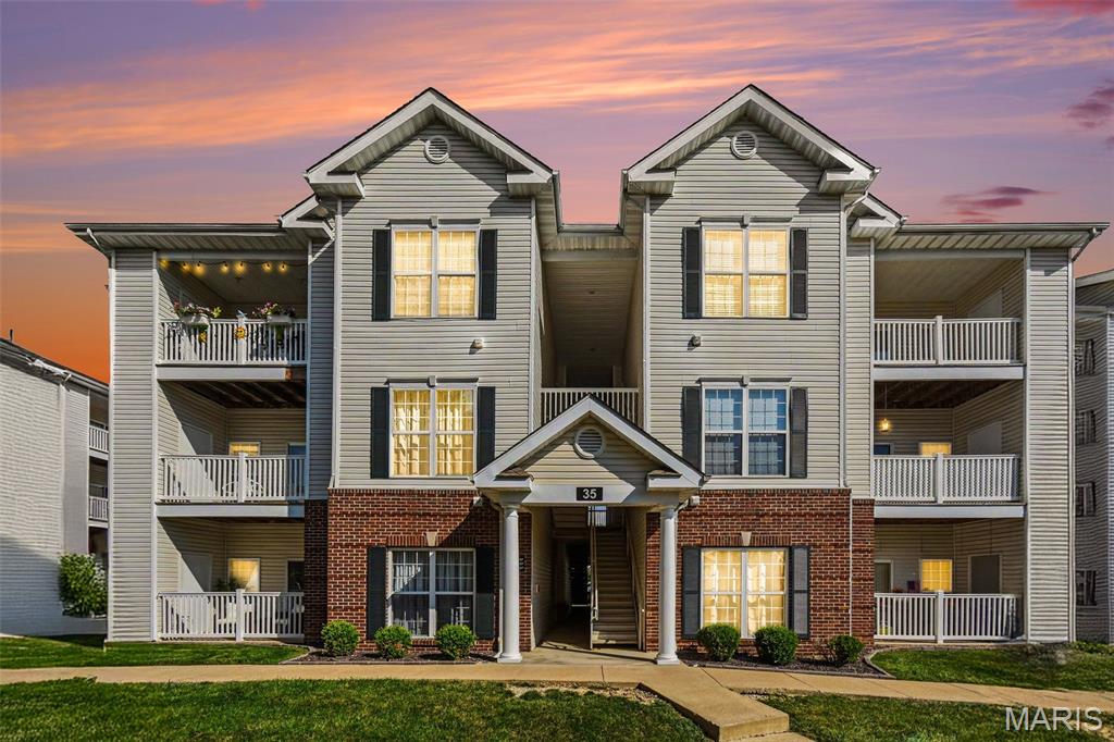 Imagine starting your morning with a cup of coffee on your private balcony, taking in peaceful water views, then unwinding in the evening to the relaxing sound of the fountain just outside your door. At 35 Kassebaum Lane #205, you’re not just buying a condo—you’re securing one of the most desirable locations in the community.

With over $10,000 in recent improvements, this beautifully maintained, move-in-ready condo offers both comfort and peace of mind. Recent updates include approximately $8,000 in new hardwood flooring, a completely new HVAC system, and $1,800 in custom cellular blinds. The refrigerator stays with the condo as well!  While many units face the parking lot, this coveted location overlooks the community pond, creating a serene backdrop you’ll enjoy year-round.

Inside, you’ll find a bright and inviting living space filled with natural light and thoughtful updates throughout. The kitchen comes equipped with a dishwasher, microwave, and stove—all less than three years old. Smart bulbs throughout the home add modern convenience, while the included window treatments help make this home truly move-in ready.

Beyond the unit itself, this condo offers amenities and features that are hard to find at this price point. Enjoy access to the community pool, dog park, parking lot camera security, and the added convenience of a dedicated covered carport—a feature not available with every unit.

Located in the heart of South County, you’ll be just minutes from shopping, dining, parks, medical facilities, and major highways, making everyday errands and commuting a breeze.

Whether you’re a first-time buyer, downsizing, or simply looking for a place that’s easy to love and easy to maintain, this exceptional condo combines valuable upgrades, desirable amenities, and a premium pond-side setting that truly sets it apart.