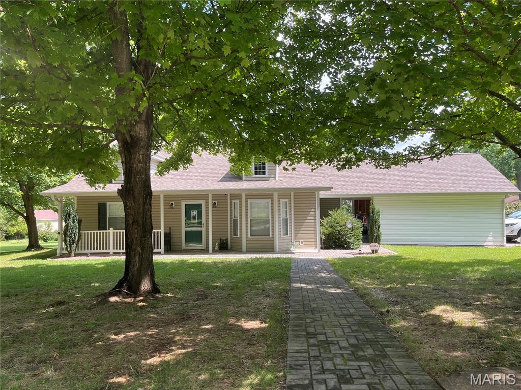 Welcome to this beautifully maintained 2-bedroom, 2-bathroom home located in Arcadia, Missouri. This home is in immaculate condition and features a spacious open-concept kitchen and living area, perfect for everyday living and entertaining. The kitchen offers a large center island with plenty of room for meal prep, seating, and gathering. The primary bedroom features a walk-in closet and private master bath. Outside, enjoy a covered back porch, fenced backyard offering plenty of space for pets, gardening, or relaxing. Additional features include a 2-car carport, providing ample parking. also a climate controlled storage closet in the carport area. Conveniently located in the heart of the Arcadia Valley and just a short drive from local shops, restaurants, parks, and area attractions. This move-in-ready home has been exceptionally cared for and is ready for its new owners!