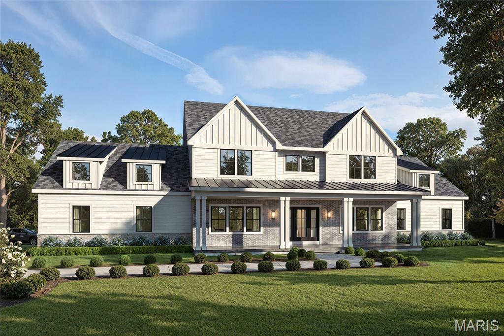 Introducing an exceptional new construction opportunity at 36 Orchard Lane in the heart of Kirkwood, thoughtfully crafted to blend timeless architectural design with modern luxury and everyday livability. Set on a spectacular 1.5-acre level lot backing to woods, this one-and-a-half story Modern Farmhouse-inspired estate offers 5 bedrooms, 4.5 baths, and an impressive 5,680 square feet of designer living space above grade. The striking exterior showcases a dramatic blend of stone, brick, and SmartSide siding, complemented by a tongue-and-groove fir-stained porch ceiling and meticulous architectural detailing. Pella windows and exterior doors enhance both aesthetic appeal and energy efficiency, while the oversized three-car side-entry garage with 10-foot wide doors offers exceptional functionality. Inside, the home is open, inviting, and masterfully designed for elevated everyday living and grand-scale entertaining. A breathtaking two-story foyer with a grand staircase sets the tone for refined interiors. The thoughtfully designed layout features two main-floor primary suites — ideal for multi-generational living or private guest accommodations. The Pro-Series, chef-inspired eat-in kitchen is a true showpiece, complete with a statement luxury island, dual-fuel cooking, built-in panel ready refrigerator, under-counter wine fridge, and a hidden cabinet door leading to a walk-in pantry. The kitchen flows seamlessly into the dining area and expansive great room, creating the perfect setting for gatherings. The primary suite offers a serene retreat with dual vanities, a freestanding soaking tub, oversized luxury tile shower with custom glass, and a beautifully curated Kohler fixture package. Main-floor and upper-level laundry rooms add convenience and practicality. Upstairs, three generously sized bedrooms each feature walk-in closets. One offers a private ensuite bath, while the remaining two share a well-appointed Jack-and-Jill bath. A spacious loft/lounge area provides additional flexible living space. Designer finishes elevate every corner of the home, including site-finished hardwood flooring throughout the main living areas and loft, solid core doors on the first floor, 3¼” casing, 7¼” baseboards, crown molding in key living spaces, and curated designer lighting and plumbing packages. Custom tile work and Kohler fixtures enhance all bathrooms with timeless sophistication. Outdoor living is equally impressive, featuring a magnificent covered patio with vaulted tongue-and-groove fir-stained ceilings — the perfect setting for morning coffee, alfresco dining, or entertaining, all while overlooking the expansive, level backyard where children can play freely. Built with 2x6 framing and equipped with high-efficiency systems, this residence includes three-zone 92% efficient Trane HVAC systems, a 75-gallon water heater, 200-amp electric service, a 30-year CertainTeed roof, upgraded blown-in insulation, and Low-E thermal-rated windows and doors — delivering both luxury and long-term performance.This extraordinary property represents a rare opportunity to own a thoughtfully designed, meticulously built estate in one of Kirkwood’s most private locations on a quiet non-through street. There’s still time to personalize this home to your exact vision — make any modifications you desire and select the finishes that reflect your style.