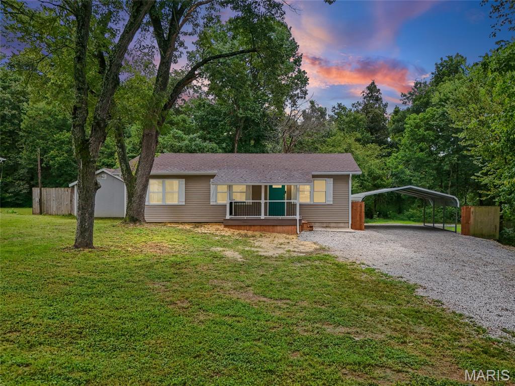 Welcome to 9632 Meadow Drive, where the work has been done and all that’s left to do is move in and enjoy! This adorable 3-bedroom, 1-bath home has been beautifully renovated inside and out with updates including new vinyl siding, roof, fascia, soffit, gutters, flooring, fresh paint, an updated kitchen and bathroom, and more. A newly added front porch gives you the perfect spot for morning coffee, while the new back concrete patio is ready for summer nights and backyard get-togethers. Even the carport area got some love with added and leveled gravel.  Inside, the elevated ceiling gives the main living space an open, airy feel that makes the home live larger than you’d expect. But the real showstopper might just be outside—step into the half-acre backyard backing to trees and imagine the possibilities. Room for firepit, garden, entertaining…or simply a little peace and privacy of your own.  Fresh, updated, spacious and ready for its next owner—9632 Meadow Drive is one you’ll want to see in person!