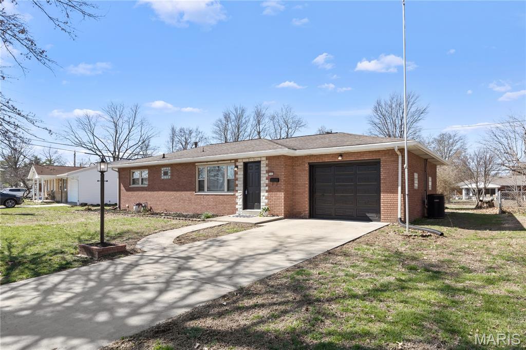Are you ready to say "yes" to the address and start your next chapter? Welcome to this beautifully updated full brick ranch offering modern finishes, functional living space, and thoughtful improvements throughout. This 3-bedroom, 1 bath home in a great Granite City neighborhood features fresh paint, new LVP flooring, and a kitchen equipped with stainless steel appliances. The attached garage adds everyday convenience, while the partially finished basement provides additional living space including a family room and second kitchen area—ideal for entertaining, hobbies, or extended living.
The large backyard features a concrete patio with a walkway leading to an oversized equipment shed, offering extra storage and a great outdoor area to entertain. Wood posts with solar lights are already installed, ready for your outdoor setup and relaxation. Recent improvements include updated sewer line with added clean out, new sump pump and plumbing stack (2022), along with a tankless water heater installed in 2025 for modern efficiency. Passed city occupancy!