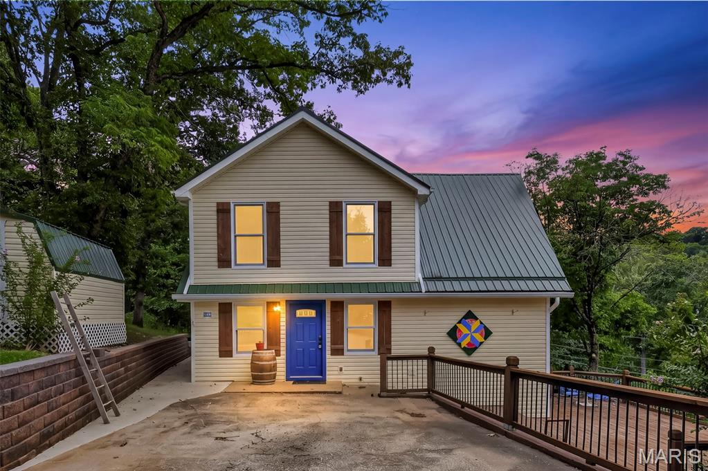 Storybook home in See Tal Estates in Hermann, MO! A charming home in a charming town! Come and see your new home in this lovely Lake Community. With 3 bedrooms, 2 baths, a wood burning fireplace & a deck with views... you won't want to leave! Take a very short walk to the lake and do a little fishing! Relax in the hot tub on the deck... private and peaceful! A metal roof covers it all and protects your investment! Homes like this are few and far between... schedule your appointment today!