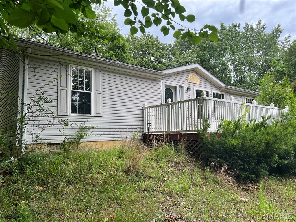 Recently updated 3-bedroom, 2-bath home situated on over 4 private acres in the Jefferson R-7 School District. The home features a spacious kitchen with plenty of cabinet space, an adjoining breakfast room, a separate dining area, and a bright living room with lots of natural light. Enjoy the large front deck and peaceful setting. The property also includes a pole barn for additional storage or workspace. Convenient location with plenty of privacy and room to enjoy.