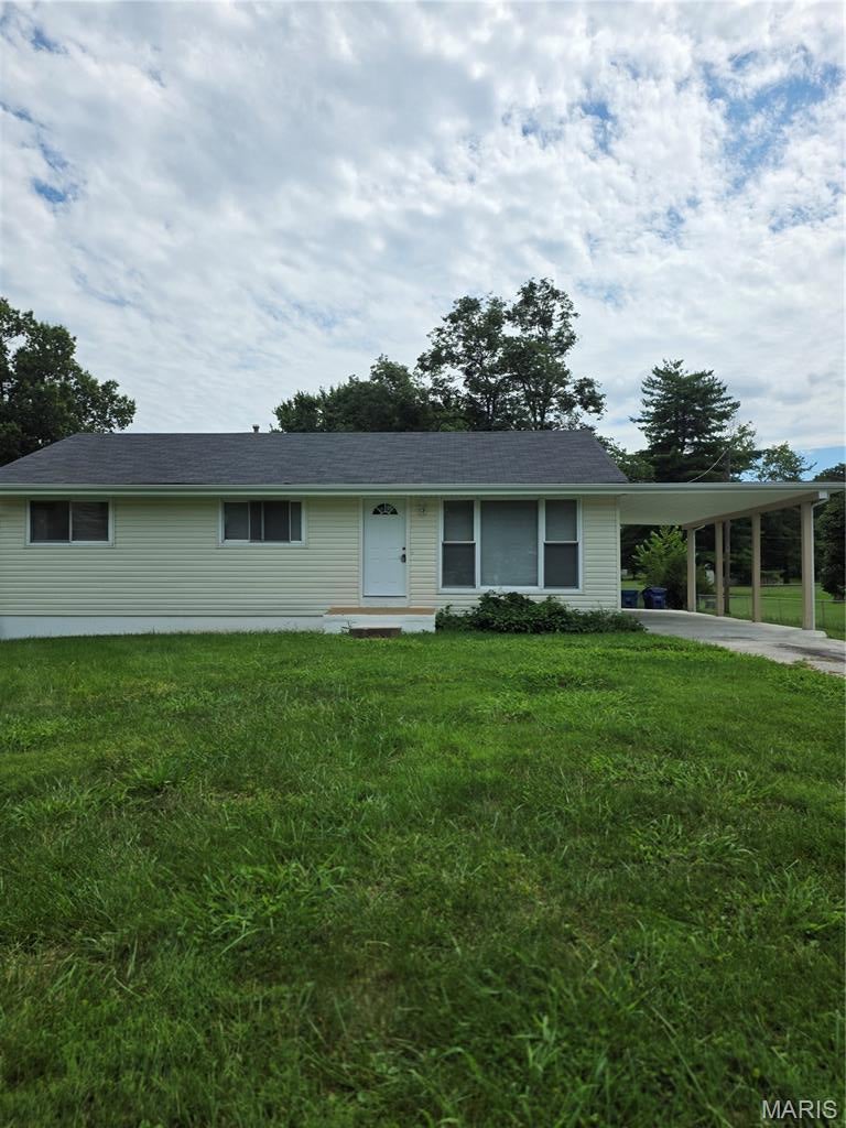 Premium .5 acre corner lot in the heart of Ellisville!  The existing 3 bedroom, 2 bath home has new appliances, paint, flooring, etc. Conveniently located near shopping, parks and much more in the Ellisville, Wildwood area. Rockwood School District - Lafayette High School area.