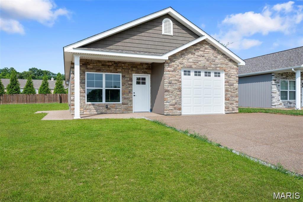Brand-new 1,400 sq. ft. home featuring 3 bedrooms and 2 bathrooms, currently under construction with an estimated completion date of mid-August. Built with quality craftsmanship throughout, the spacious kitchen will offer Amish-made cabinetry, granite countertops, stainless steel appliances, and a stylish tile backsplash. Luxury vinyl plank flooring and ceramic tile will provide both durability and elegance. The primary suite will feature a large walk-in closet and a private full bath. The oversized garage will be fully insulated, drywalled, and painted. Exterior concrete surfaces will showcase attractive exposed aggregate finishes. Don't miss the opportunity to own this beautiful new construction home!