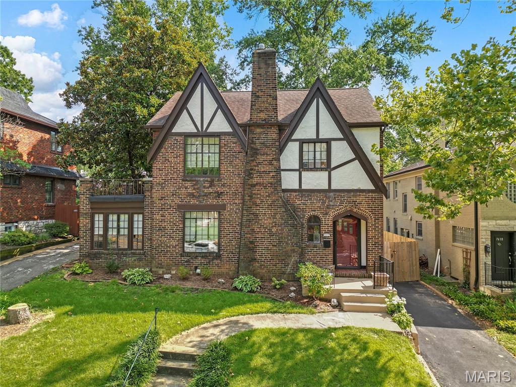 Storybook charm meets modern living in this light-filled, three-bedroom, two-bath 1925 English Tudor. Timeless architectural details blend beautifully with thoughtful updates, including a stunning renovated kitchen, fresh interior paint, new window blinds and updated fixtures. The level yard, new privacy fencing and flagstone patio create an inviting outdoor retreat with plenty of room for pets, gardening and entertaining. Additional improvements include refreshed landscaping, two new front retaining walls, a sealed driveway, a new kitchen faucet and glass shower doors upstairs. Enjoy abundant storage, generous off-street parking and an oversized detached two-car garage. Starbucks, Dewey’s Pizza and neighborhood shops are just half a block away, with the dining, shopping and attractions of Clayton and University City nearby. A warm, character-filled home in an exceptionally convenient location!