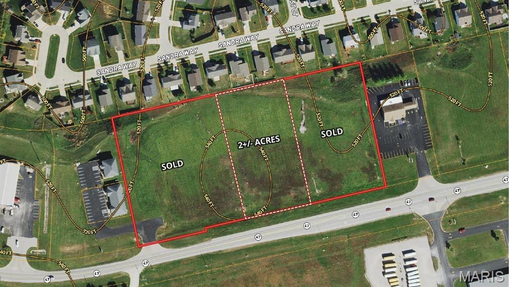 This 2-acre tract has a lot going for it. It has all public utilities on-site and it is shovel ready.  This parcel has gently sloping to level topography and high traffic visibility from Hwy. 47.  It is a wonderful spot for a retail operation or strip center for professional services, with over 200' of highway frontage.  Minimal restrictions, if any. Location: City, High Traffic