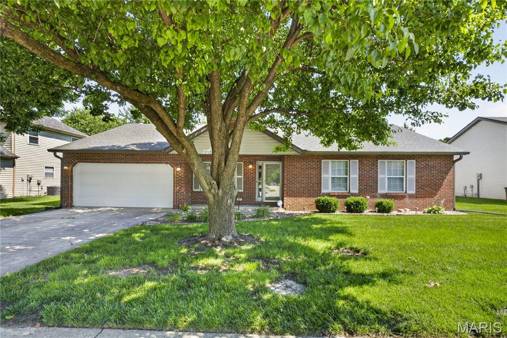 New Listing in the Desirable Wolf Branch School District! This well-maintained one-level ranch offers comfort, convenience, and move-in-ready appeal. Featuring 3 bedrooms and 2 full baths, this home boasts a beautiful arched ceiling that creates an open and inviting atmosphere. Enjoy cozy evenings by the fireplace and appreciate the fresh look of the new flooring in the kitchen and dining area. Step outside to relax under the Sun setter awning on the back patio, overlooking a backyard fully enclosed with a white vinyl privacy fence perfect for entertaining, pets, or peaceful outdoor enjoyment. Additional updates include an encapsulated crawl space for added efficiency and peace of mind. The home has already passed occupancy inspection and includes a spacious 2-car garage. With so much to offer, this move-in-ready home is ready for its next owner. Don't miss out call your favorite Realtor today to schedule your private showing! Seller is motivated!