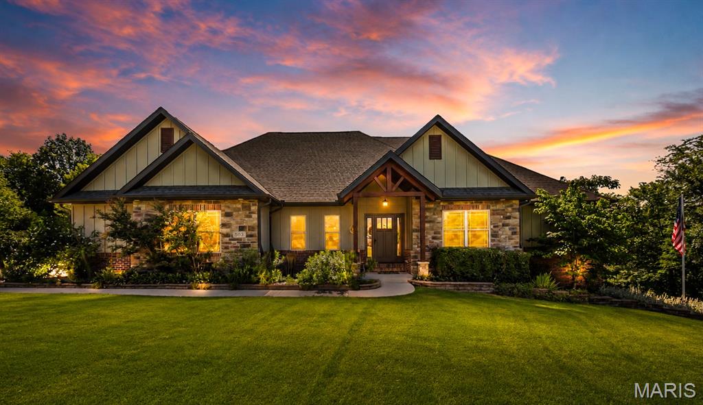 Located near the end of a dead-end road in a gorgeous, well-maintained neighborhood, this remarkable property offers a rare combination of privacy and outdoor living. Backing up to woods and situated on nearly 8 private acres, you'll enjoy peace and seclusion while remaining part of an attractive, established community.

Inside, you'll find 5 bedrooms, 4 bathrooms, soaring ceilings, abundant natural light, and a split-bedroom floor plan designed for both everyday living and entertaining. The spacious layout offers room for everyone, while the partially finished basement provides flexible living space, tons of storage, and a convenient John Deere room.

Step outside to your own private retreat featuring a saltwater pool, a covered deck overlooking the pool, and expansive outdoor entertaining spaces. A separate drive leads to a  firepit area, creating the perfect setting for gatherings with family and friends.

The property's wooded acreage is truly something special. Explore the  private trails that lead to a pond with full owner access, or continue on to a charming creek bridge where you can enjoy peaceful walks, abundant wildlife, and the beauty of nature right outside your manicured lawn. Whether relaxing poolside, entertaining guests, or exploring the outdoors, this property delivers an exceptional lifestyle that's a rare find.