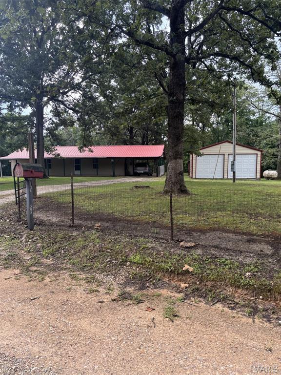 This 2 bed/1 bath home sits on a BEAUTIFUL, PRIVATE and GATED 3.1 Acre lot!!
You're going to LOVE the attached carport, 2 car detached garage with concrete floor and electric, and TWO SHEDS!!
Enjoy your evenings on the covered front porch or on the rear patio and fire pit!
This IS where the deer and the turkey play!!
