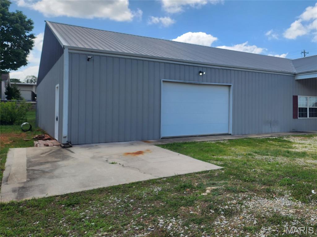 Approx. 3,100 sq ft commercial space available for lease with high visibility on Business 67S. The interior is temperature controlled shop/warehouse space with overhead door, two rooms that could be converted into office space, one bathroom, kitchenette area, signage on building and 9'x4' lighted signage at the road. Owner pays electric, water, sewer and trash. This property is just outside city limits without restrictions. 3338 S Westwood Blvd-Option 2, Poplar Bluff. $1,700/monthly.