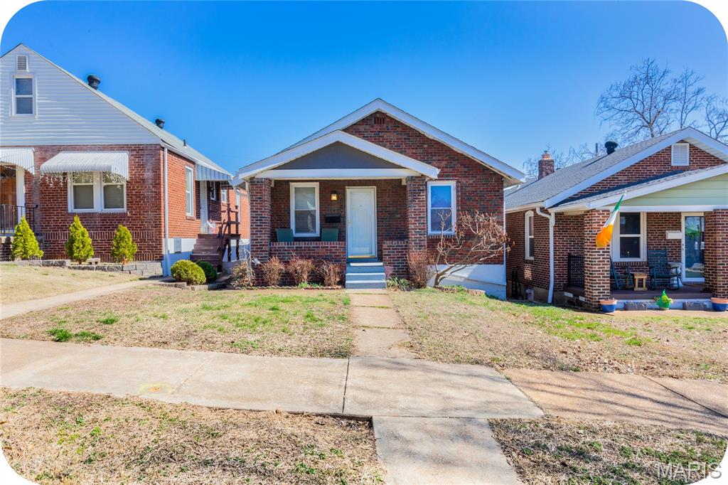 This charming home in Dogtown offers the perfect blend of comfort and convenience, with easy access to Highways 40 and 44 and tucked away on a quiet street. Inside, you’ll find an updated kitchen and bath, two generously sized bedrooms with ample closet space, and a versatile family room overlooking the backyard. The partially finished lower level provides even more living space, complete with a clean utility room, abundant storage, and a laundry area — making it both functional and comfortable. Step outside to enjoy the covered front porch, fenced backyard, and one-car garage. Major updates include newer windows, roof, electrical, and sewer lateral, offering peace of mind for years to come. Enjoy being within walking distance to Dogtown’s favorite local bars and restaurants, and less than a mile from Forest Park — home to the Saint Louis Zoo, Saint Louis Art Museum, Missouri History Museum, golf courses, tennis courts, ice skating, miles of running and biking trails, and outdoor performances at The Muny — plus major annual events including St Patrick's Day Parade, July 4th celebrations, concerts, and balloon races. Don’t miss the opportunity to own a home in one of St. Louis’ most vibrant and walkable neighborhoods.