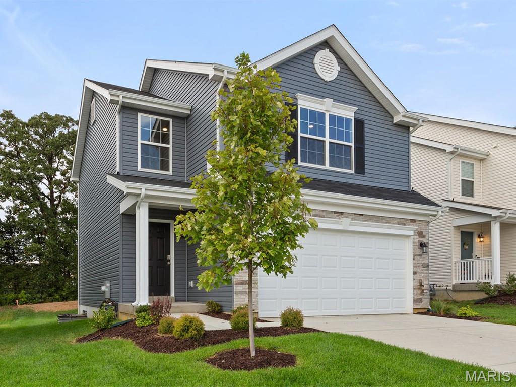 New McBride Homes 2 story Arlington 3BR, 2.5BA will be move-in ready this spring! 6’ windows & wood laminate flooring throughout main living area. The kitchen features painted white 42” tall cabinets, quartz countertops, & stainless-steel GE appliances. The breakfast area opens to the backyard, and the living room features a large window & ceiling fan. The master suite features 2 walk-in closets & private bath w/5’ walk-in shower. 2 more bedrooms w/walk-in closets, full bath, & 2nd floor laundry add convenience. Extras include white 6 panel doors, ceiling fan prewires, main floor powder room, 2-car garage w/coach lights, & more! Located in House Springs, this community features 263 homesites off Bear Creek Road, just east of Gravois Road and Carol Park Road. Enjoy peace of mind with McBride Homes’ 10 year builders warranty and incredible customer service! Similar photos shown.