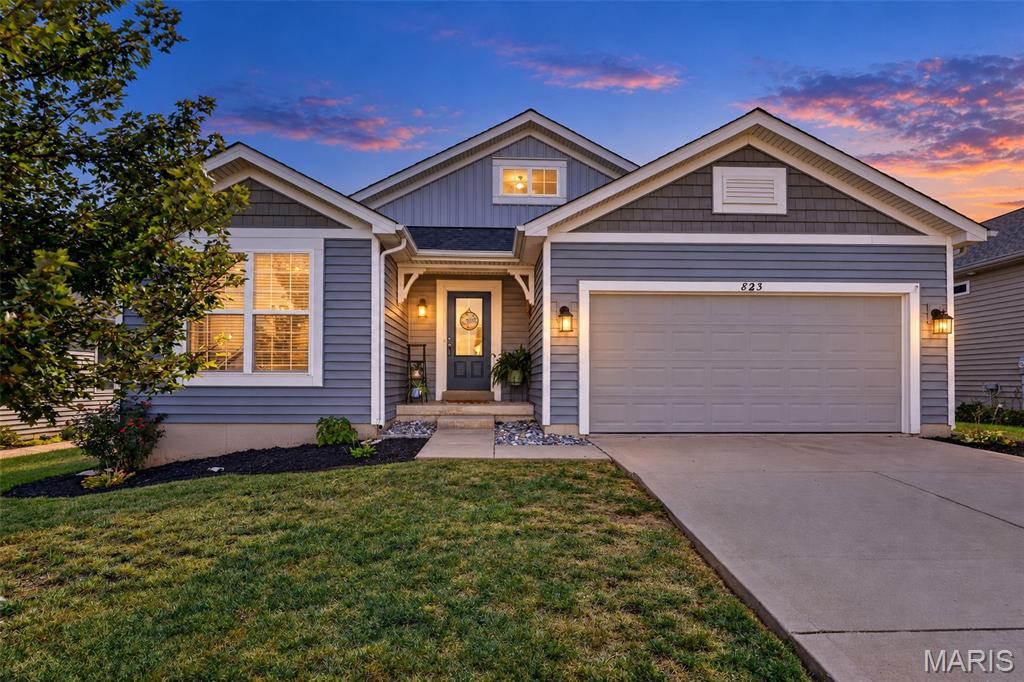 Welcome home to this BEAUTIFUL RANCH in the highly sought-after CARLTON GLEN community! Offering nearly 1,800 SQ. FT. of living space on the main level, this 3-bedroom, 2-bath home features a desirable SPLIT-BEDROOM FLOOR PLAN, Neutral Decor, VAULTED CEILINGS, and BRAND-NEW CARPET in all bedrooms.

The open-concept design is perfect for everyday living and entertaining, featuring a separate dining room and a stunning kitchen with QUARTZ COUNTERTOPS, 42-INCH CABINETRY, STAINLESS STEEL APPLIANCES, built-in microwave, spacious pantry, center island with pendant lighting, and an adjoining breakfast room.
The vaulted PRIMARY SUITE is privately situated on one side of the home and features a spacious WALK-IN CLOSET and en-suite bath with a SOAKING TUB and SEPARATE SHOWER. Two additional bedrooms and a full bath are located on the opposite side of the home.
Step outside and enjoy the recently added 12’ x 22’ ENTERTAINING DECK—perfect for relaxing or hosting family and friends. Additional highlights include MAIN-FLOOR LAUNDRY, a convenient mudroom off the garage, and a spacious lower level with an EGRESS WINDOW, ROUGH-IN FOR A THIRD BATH, and an expansive footprint offering endless possibilities for future finished living space.
Enjoy the wonderful CARLTON GLEN amenities, including a COMMUNITY POOL, CLUBHOUSE, & PLAYGROUNDS. This one is a MUST-SEE!