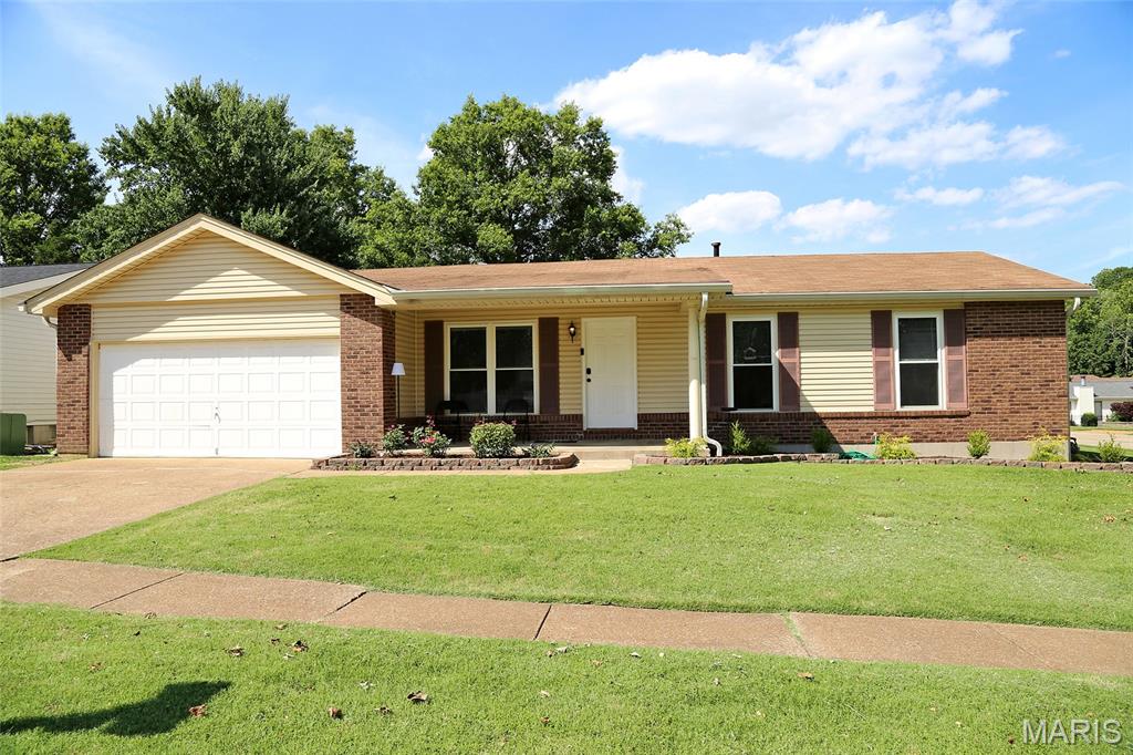 Welcome to this beautifully maintained ranch home featuring a newer updated kitchen and an inviting open floor plan. The cheerful white kitchen includes a new Dual Fuel Range with True Convection and Air Fry Oven. Beautiful wood veneer flooring in the kitchen and the breakfast room flow seamlessly into the spacious family room, creating a perfect space for everyday living and entertaining. Step right out from the family room to a patio and level backyard—ideal for family gatherings, pets, or just relaxing outdoors. The bright living room is also open to the kitchen and breakfast area, enhancing the home’s airy feel and functional layout. The main level offers comfortable living, while the partially finished lower level provides additional flexibility with two separate sleeping areas—perfect for guests, a home office, hobby space, playroom, den or work-out room. Additional highlights include a 2-car garage, desirable corner lot, and included appliances—washer, dryer, and 2 refrigerators all stay! Don’t miss this move-in ready home that combines comfort, convenience, and great indoor-outdoor living.