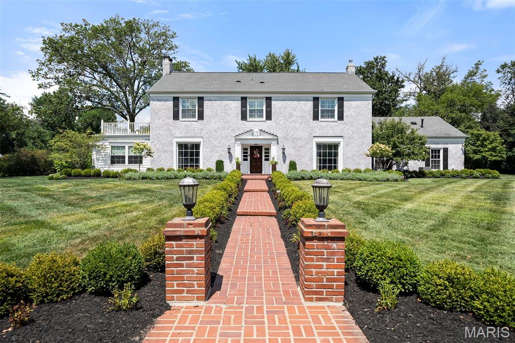 Welcome to 61 Briarcliff, a beautifully updated 5-bedroom, 4 full and 2 half-bathroom residence offering over 6300 total sq ft of living space on a prime corner lot in one of Ladue’s most sought-after neighborhoods. Located in the award-winning Ladue School District and minutes from shopping, dining, and major thoroughfares, 61 Briarcliff is a rare opportunity in an unbeatable location. The inviting center hall floor plan opens to formal living and dining rooms, ideal for hosting gatherings. An expansive den/office with custom built-ins adds versatility and charm. The heart of the home is the stunning, updated kitchen that seamlessly connects to the spacious family room—perfect for everyday living.
Upstairs, the luxurious primary suite is complemented by three additional bedrooms (one is currently being used as a primary closet) and two full bathrooms. A private fifth bedroom suite, accessed via a separate staircase, is ideal for guests, teens, in-laws, or a dedicated home office. The finished lower level offers a large family room with a bar and fireplace—an ideal retreat. Step outside to your private oasis with an expansive patio, lush landscaping, and a sparkling pool—just in time to enjoy the remainder of summer. We invite you to come see your next home.