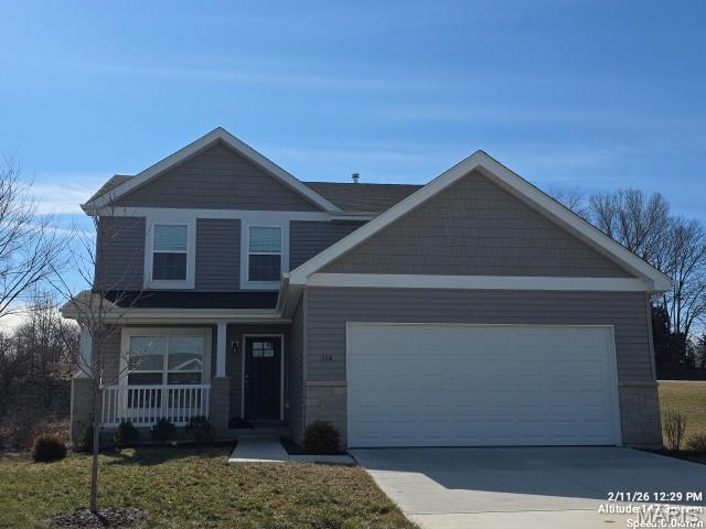 Two story home with an attached two car garage! Special features include: ceiling fans,  open concept main floor, quartz counter tops, 42 inch cabinets, laminate flooring and so much to offer! Exterior has a covered porch, vinyl siding, enclosed soffits and fascia and new stair to the backyard. Main floor has family room with large windows, kitchen and eating area. and half bath! The upper level has a sitting area, laundry hookups, three bedrooms and two full bathrooms.  Primary bedroom has en-suite, double vanity, tub and shower and walk in closet. Two additional rooms on the second floor. Easy to show, set your appointment today!