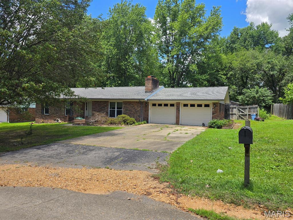 As summertime is fast-approaching, are you searching for a home with an in-ground pool to relax and enjoy the hot days and nights?  This brick home in a subdivision near Dexter Schools has just what you need!  A one-level home which has 3 bedrooms, 2 bathrooms, a cozy living room with a fireplace, a large kitchen with ample cabinets and a breakfast bar, a dining room, and a large family room connected to the screened-in sunroom overlooking the swimming pool complete with an attached 2-car garage.  Some recent updates include new flooring, freshly painted, and some new light fixtures throughout most of the home.  You can enjoy your inside area and outside area during the multiple seasons.  A few more projects could personalize this home for your family and friends to enjoy with you.  The backyard is fenced and includes a pool house for the pump with room for your pool supplies.  The patio is perfect for relaxing by the pool or grilling your favorite meal while entertaining your pool guests.  Don't miss your opportunity to view this home today.