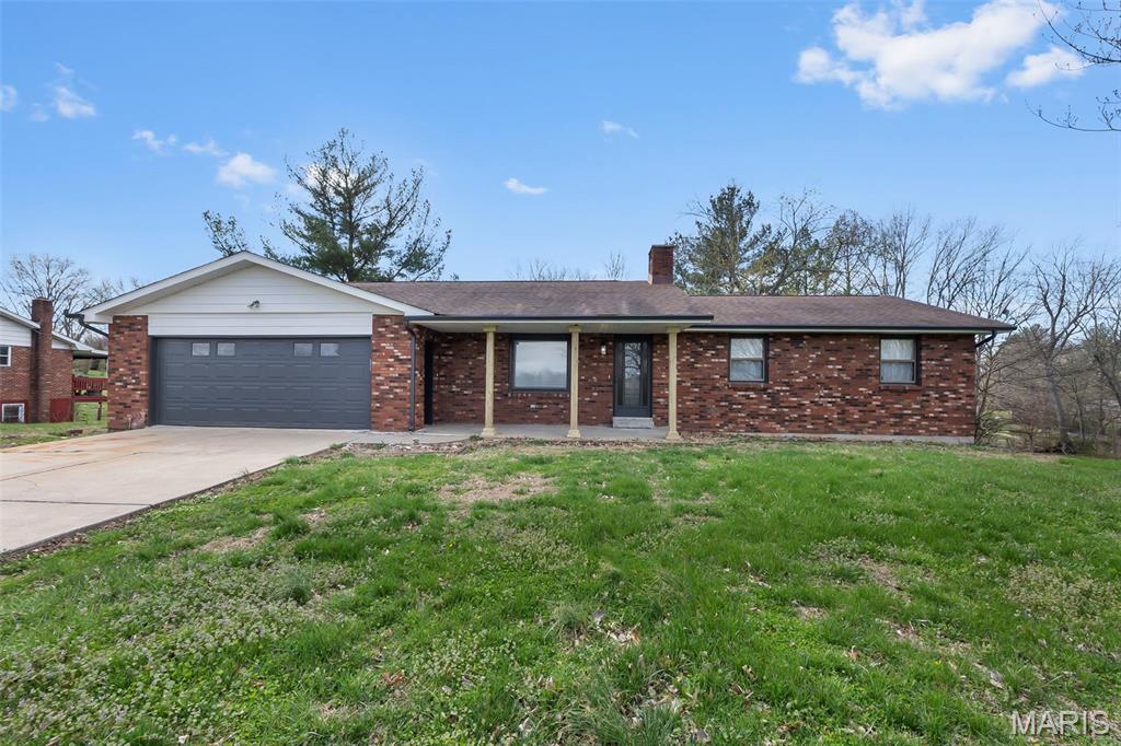 Welcome to 5569 State Highway 72 — a full brick ranch that checks all the boxes for its next owners! Situated just outside Jackson, this updated and remodeled home offers over 2,600 sq ft of living space, featuring 4 bedrooms and 3 baths total. Enjoy a spacious kitchen and dining area ideal for everyday living and entertaining. The walk-out basement provides additional living space with a cozy fireplace, plus a John Deere room with abundant storage. Step outside to relax on the covered back porch overlooking the chain-link fenced backyard. Additional highlights include an oversized garage, a beautiful tiled shower in the hall bath, and the convenience of country-style living just minutes from town. This well-maintained home offers space, updates, and functionality — schedule your showing today!

Seller is Missouri licensed REALTOR.