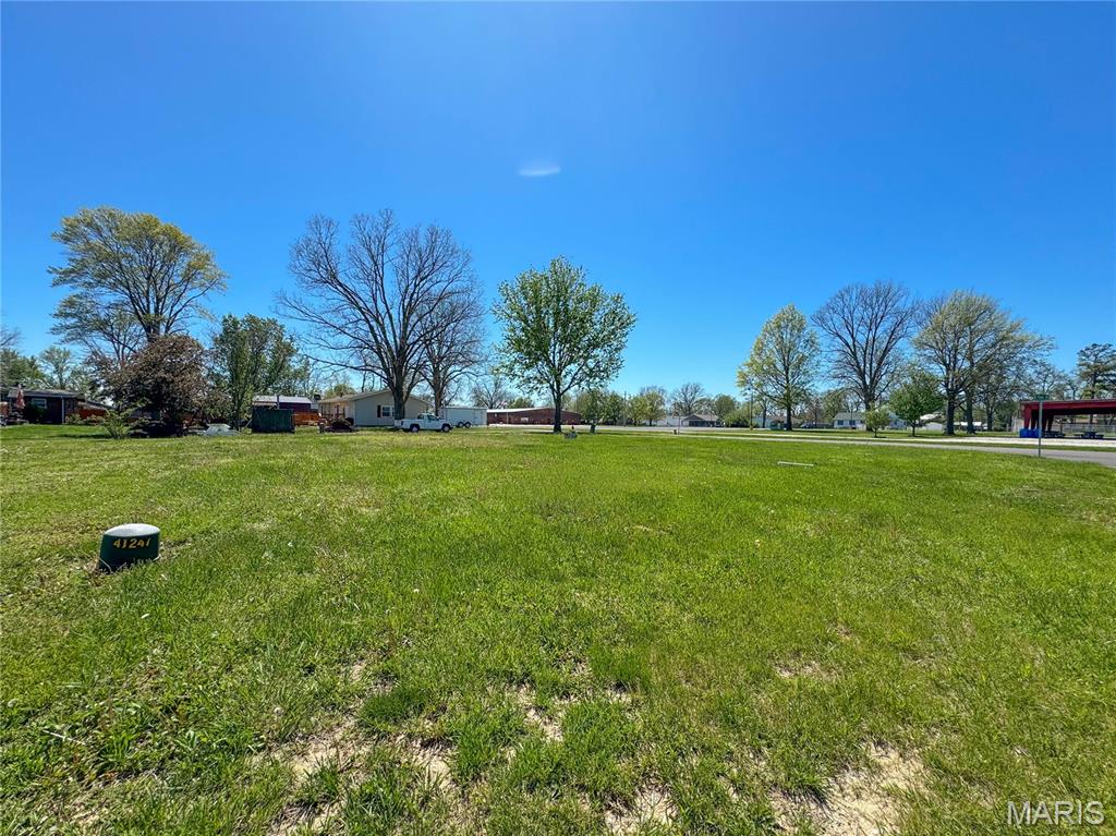 Approx. .23 acres corner lot in quaint Freedom Village subdivision. Bring your own builder and be part of this historic community.  Building requirements are at least 1350 square feet (1 story) with a 2 car attached garage. Hecker was originally named "Freedom" where the first home was built in  1849.  Neighborhood is well established and in WATERLOO SCHOOL DISTRICT. Situated directly across from the Hecker ball parks and community center which is provides easy access to play and events. The building season is just around the corner and Hecker is a great place to consider.  Agent Owned