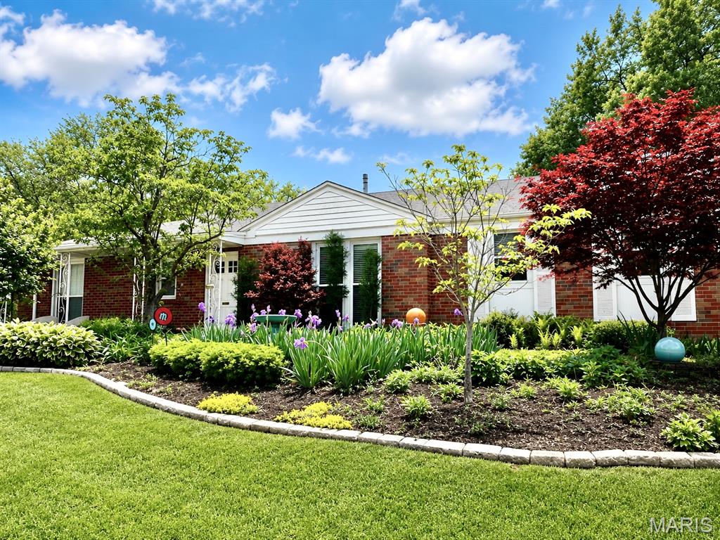 Welcome to this beautifully maintained ranch home in desirable University City, directly across from Ruth Park Golf Course! The charming, low-maintenance perennial gardens create a warm first impression, while the home's abundance of natural light offers the perfect blend of comfort, style, and space. Ideally located near shopping, dining, parks, and major thoroughfares, you'll enjoy convenience while still feeling tucked away from the hustle and bustle. An elegant entry welcomes you into a bright, spacious living room that flows seamlessly into a cozy family room, creating the perfect setting for both everyday living and entertaining. The thoughtfully updated vintage kitchen serves as the heart of the home, featuring granite countertops, a tile backsplash, stainless steel appliances including a Bosch cooktop, convection oven, and dishwasher, a Samsung refrigerator, and additional cabinetry for exceptional storage. Three generously sized bedrooms complete the main level. Downstairs, the expansive, beautifully finished lower level offers endless possibilities—whether you envision a recreation room, media space, home office, fitness area, or guest retreat. Step outside to enjoy the deck overlooking the backyard, while the oversized driveway provides ample space for guests and outdoor gatherings. With its inviting spaces, thoughtful updates, and exceptional location, this move-in-ready gem is one you won't want to miss!
