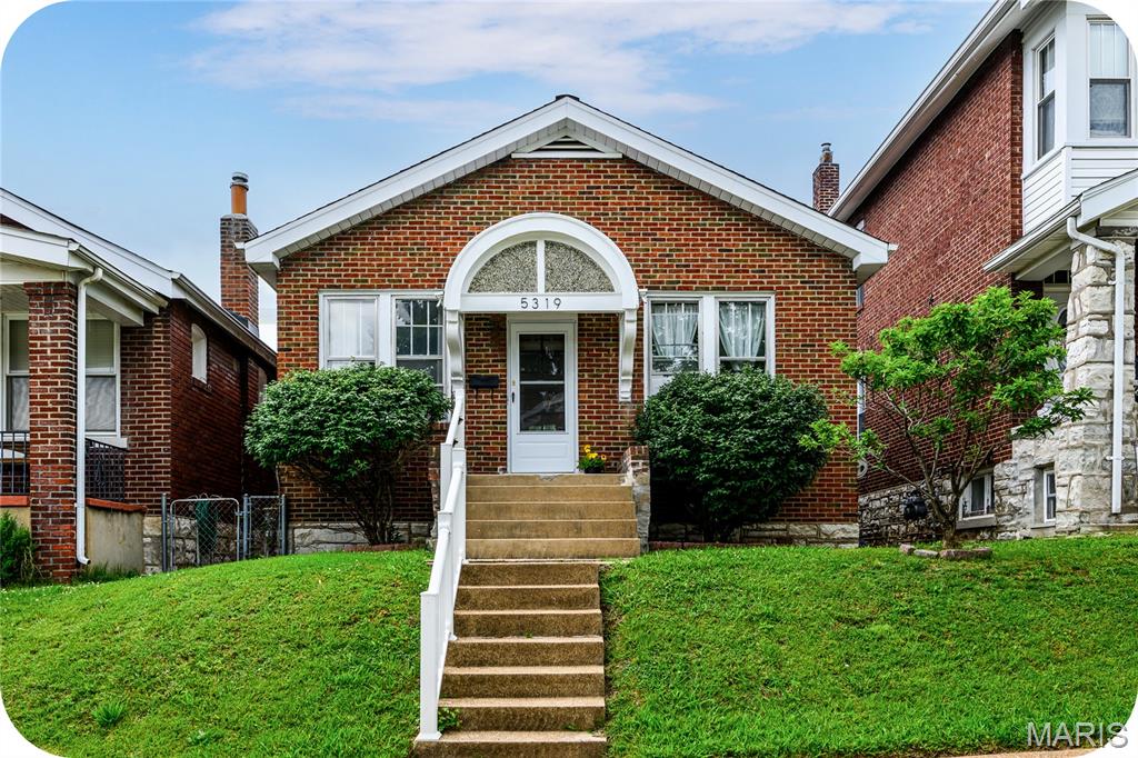 Holy walkability AND affordability, Batman! An amazing location within walking distance to all that the Macklind Business District has to offer (Clementine's, Russell's and Big River Running Company to name a few) at this price point is unheard of! This adorable brick bungalow is light, bright and totally ready for a new owner with fresh paint throughout, charming hardwood floors and colorful stained-glass windows. Highlights include a commodious living room, primary bedroom with WALK IN closet (you read that right!), another nice bedroom, and a second WALK IN closet for even more pantry/linen/whatever your heart desires storage. A cute full bath with updated vanity and spacious eat-in kitchen with tons of cabinet & counter space round out the main floor. The fully fenced, flat backyard, deck and patio are perfect for relaxing or entertaining guests and there is even enough off-street parking space for 3 cars on the concrete parking pad. Don't miss the convenient features here such as plenty of basement storage space plus new HVAC and air duct cleaning in 2021 for peace of mind. Truly an unbelievable value for all that this home has to offer in a prime, desirable Southampton location.