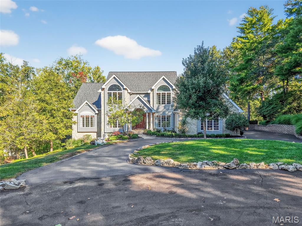 Welcome to your Dream Lake Home in the Heart of Chesterfield; nestled on a picturesque 3-acre lot along a serene lake. Surrounded largely by undeveloped land, this property is truly one-of-a-kind, blending comfort & outdoor living in perfect harmony. Thoughtful updates throughout: main flr primary suite, main flr gleaming hardwood flrs, custom moldings, solid wood doors, 9’+ ceilings & surround sound. The 2 sty foyer is flanked by a well appointed dining rm, a sun-drenched sitting rm & leads to the vaulted great rm. Center stage is the gorgeous stone fireplace along w/ a custom library nook. Chef’s kitchen features quartzite counters, custom cabinets &a breakfast rm surrounded by windows. Stylish main flr primary suite has new hardwood flrs & primary bath feat. sep.vanities, jet &steam shower, heat flrs, & WIC. Upstairs: 1 en-suite bedrm & 2 add. bedrms connected by a jack & jill bath; all with great views of the lake. The expansive LL offers multiple living areas & updated full bath. Step outside & be transported to your personal paradise. The in-ground pool oasis w/ stone fireplace, hot tub & fountain invites you to unwind & relax in style. New deck.Covered patio. The grounds feature an English-style garden that leads to a small cottage / studio, a fire-ring & charming chicken coop for your fancy chickens. Perfect for artists, gardeners & those seeking a peaceful retreat. Fishing, Kayaking & much more; an outdoor lover’s dream! This home offers unmatched beauty & lifestyle.