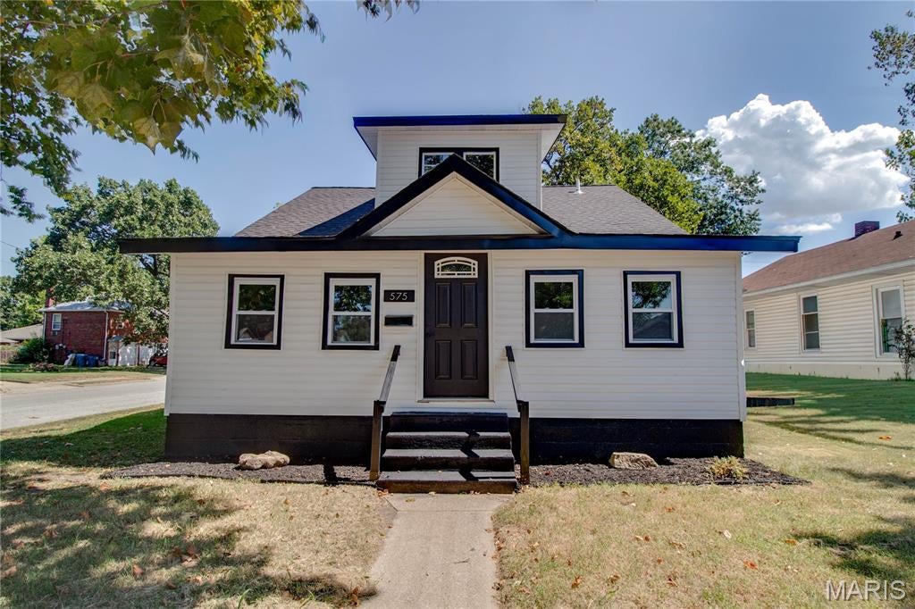 The hard work is done—just move in and enjoy! This fully renovated 4-bedroom, 2-bath home on a corner lot has been transformed from top to bottom with an incredible list of updates. The home features all-new flooring, fresh paint throughout, new doors, beautifully updated bathrooms, and a stunning new kitchen complete with cabinets, countertops, a pot filler, and included appliances. The improvements continue beyond the cosmetics with new windows, a new roof, new siding, soffit and fascia, completely replaced plumbing including water and drain lines, a new 50-gallon water heater, and updated electrical with all-new outlets and switches. The detached Over sized 1-car garage has also been updated with new siding, soffit and fascia. A full unfinished basement adds even more potential for storage, hobbies, or future living space. This is the kind of renovation where you can move in without immediately making a list of projects. Agent owned.
