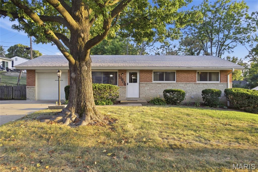 Pride of ownership for 36 years! This 3 bed/2 full bath ranch home with over 1,600 sq ft of finished space has been loved and well taken care of and is ready for the next owner! As you pull up, you will notice the brick and stone facade, attached garage, and spacious double driveway with a gate/additional side parking. Upon entry, you will love the hardwood flooring and gas fireplace with surrounding built ins in the living room which flows to the eat In kitchen area/kitchen. Stainless steel refrigerator is less than a year old which stays with the home. The kitchen has a built in microwave, ample countertop space, a dishwasher, and sink overlooks the backyard. There is an office/mud room area off of the garage, and off of the eating area, there is a large covered patio and spacious fenced in yard. The main floor also features 3 bedrooms and an updated full bath. The living space continues in the lower level with a spacious rec room area with recessed lighting and another full bath. There is plenty of unfinished storage space, and the lower level has its own furnace, a sump pump, and plenty of windows for natural light. Washer and dryer stay with the home. Roof 6 years old. Great neighborhood and the convenient location is also a bonus! Open House Sunday, Sept. 27th 1:00-3:00PM.