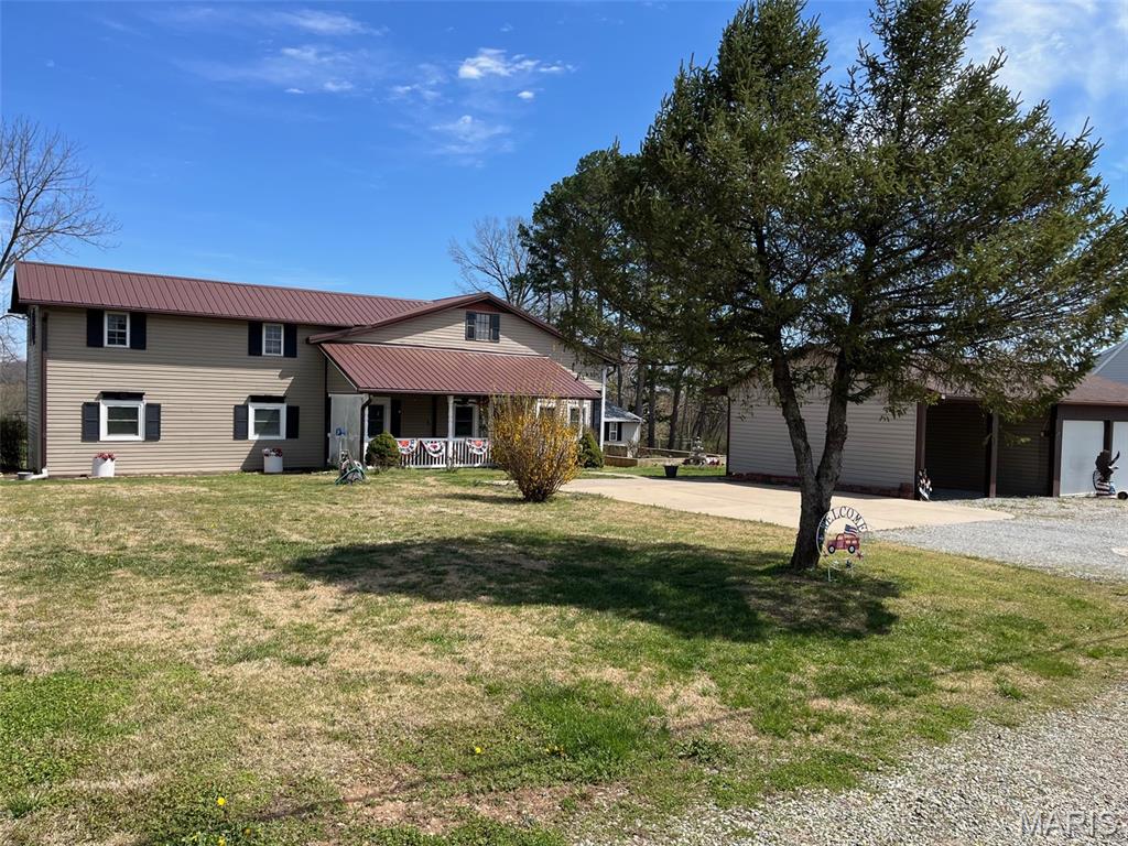 Located at 1507 Highway OO, Fredericktown, MO, this single-family residence presents a wonderful opportunity to create a comfortable haven. Built in 1970, this 5 bedroom & 2-1/2 bath property offers a solid foundation for your vision. Many recent upgrades to the home add appeal like granite countertops, new HVAC, new windows, roof, septic, enclosed sunporch, flooring, covered front porch and a partially covered back deck. Numerous outbuildings for all your hobby needs, or future business endeavors. This single-family residence eagerly awaits its new owner.