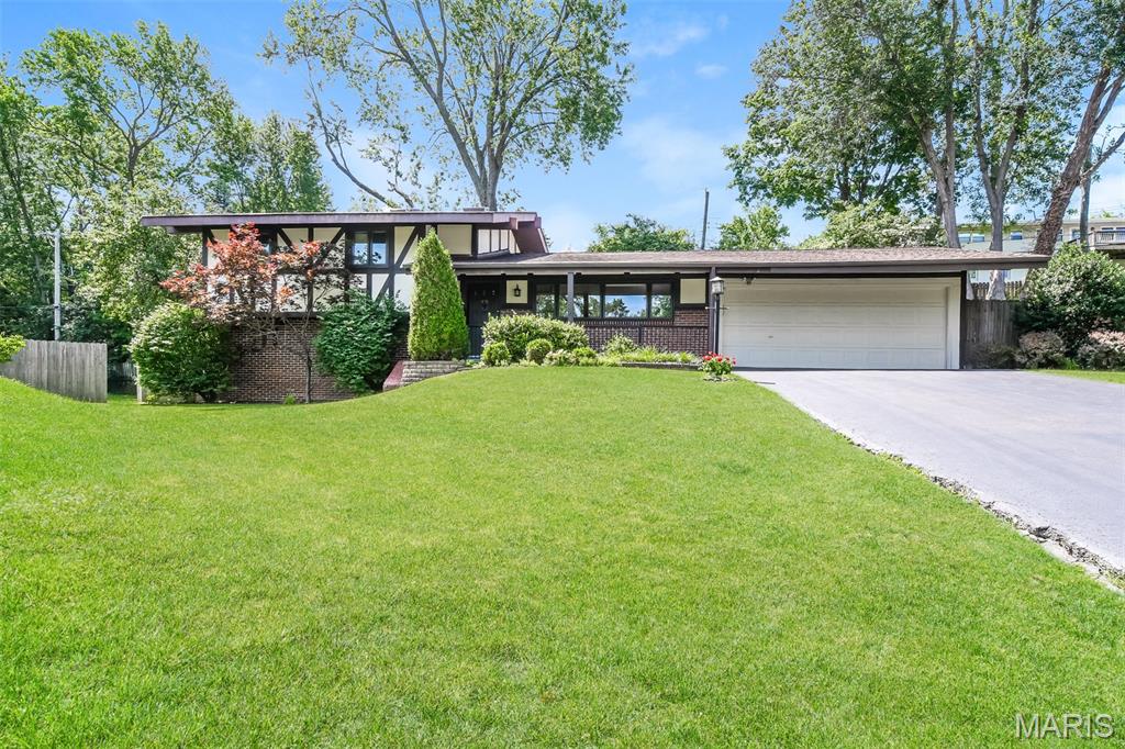 Spacious, updated, and move-in ready, 123 Brookside Court offers over 2,200 square feet of living space across four levels in a highly desirable location. Inside you'll find vaulted ceilings, skylights, refinished hardwood floors, an updated kitchen with granite countertops and abundant cabinetry, plus a finished lower level that provides additional living and entertaining space. The large, private backyard is a true standout feature, offering plenty of room to relax, play, or host gatherings on the low-maintenance deck. With 3 bedrooms, 3 bathrooms, multiple living areas, and an attached two-car garage, this home offers the perfect combination of space, comfort, and functionality.