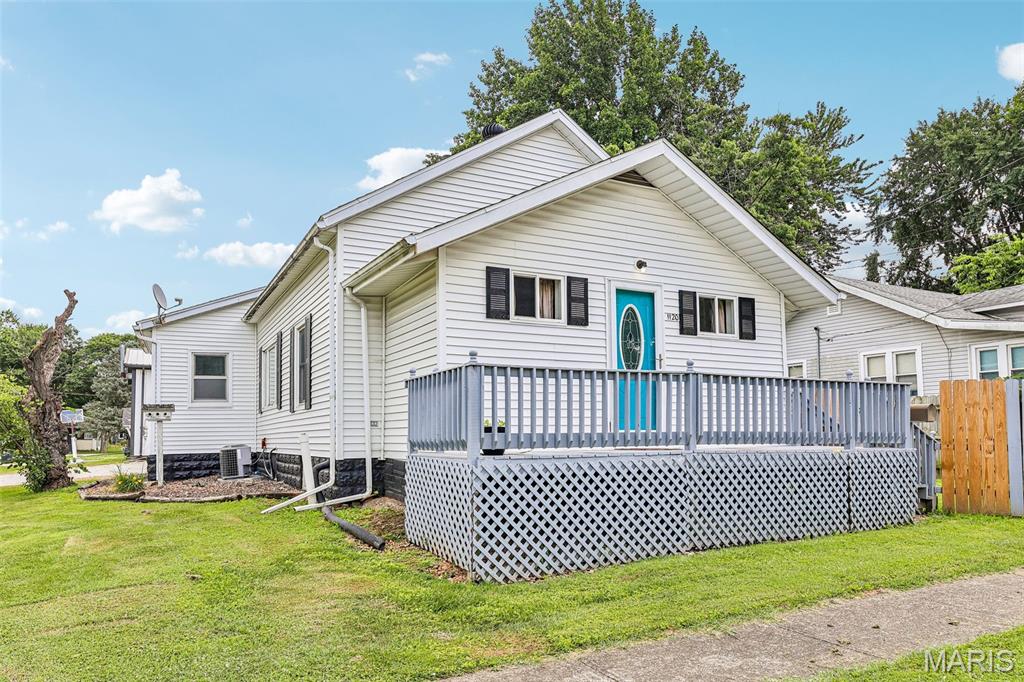 Welcome home to this charming 2-bedroom, 1-bath property offering spacious living, beautiful hardwood floors, and a great sized pole barn! Step inside to find an oversized living and dining area filled with natural light, creating the perfect space for entertaining or relaxing. The kitchen offers abundant cabinet and countertop space, making meal prep a breeze while providing plenty of storage. Both bedrooms feature hardwood flooring, generous closet space, and lots of space. The full bathroom has been updated and is also spacious. Outside, you'll love the inviting front deck—perfect for enjoying your morning coffee or unwinding in the evening. A large pole barn provides endless possibilities for parking, hobbies, a workshop, or extra storage, making this property ideal for anyone needing additional workspace. Pole barn has tall doors. Whether you're looking for your first home, downsizing, or if your kids annoy you and you want to make them live in the pole barn, this property is the clear winner!