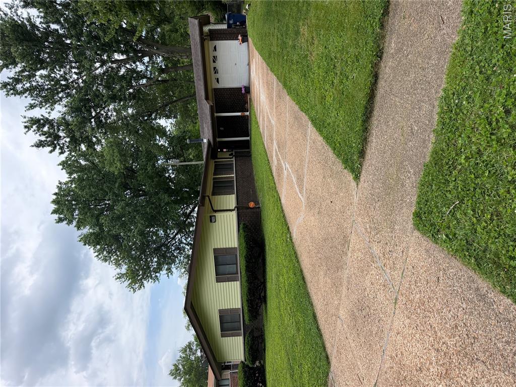 Large ranch with everything on the main level! Flat fenced back yard, with large, shaded patio! 3 large bedrooms. No carpet, All ceramic tile flooring. Both bathrooms are updated and have bathtubs and showers, Large updated eat in kitchen/breakfast room, large foyer, newer furnace, central air, and garage door opener, some newer windows