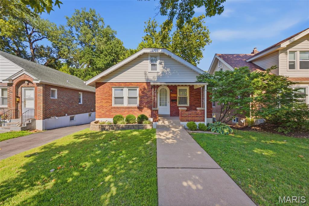 Welcome HOME! Don’t miss out on this charming bungalow nestled in the Sycamore Hills neighborhood! This inviting 2-bedroom, 1-bath home is full of character and warmth.  From the archway doors entering home to the living rooms beautiful stained glass windows.  Kitchen has ceramic tile along with custom cabinetry and additional pantry space. Main floor Primary bedroom with luxury plank vinyl.  Upstairs you will find the 2nd bedroom with two closet spaces and windows which possibly could be converted into a third room. Enjoy relaxing mornings or cozy evenings in the three seasons room outback. The attached garage provided added convenience along / extra storage in basement area. This adorable home is one you won’t want to miss! Schedule your showing today!