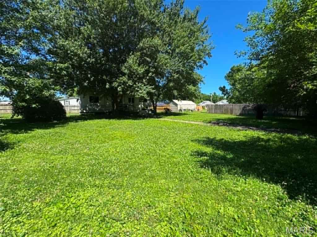Three Fully Fenced City Lots with Endless Possibilities!

Don’t miss this opportunity to own three spacious city lots offering plenty of room and flexibility. The property is fully fenced and is currently being used for storage, but it’s ready for your vision! Whether you’re looking for a place to build a new home, create a recreational getaway, expand your garden, or simply enjoy extra outdoor space, this property has great potential.

A 20x40 carport and fifth wheel camper currently on the property are available for separate purchase — carport for $2,500 and camper for $1,000.

Property is located in a designated floodplain; however, the seller reports it has only flooded once, over 10 years ago.

Bring your ideas and make this versatile property your own!
