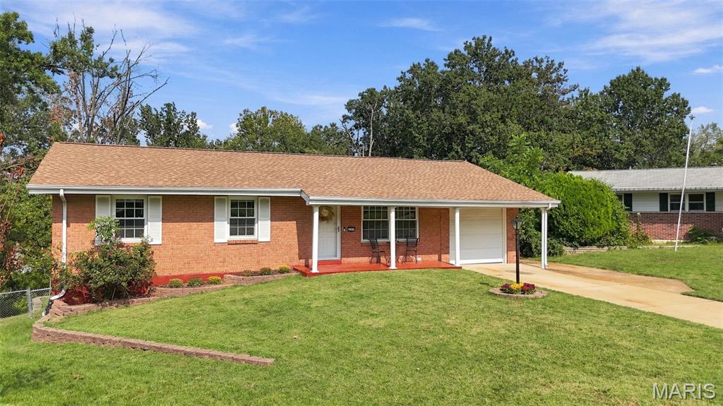 This beautifully updated 3-bedroom, 3-bath ranch offers comfort, functionality, and numerous desirable features. The main level welcomes you with a spacious living room featuring hardwood flooring. The kitchen, complete with a center island, ideal for entertaining, casual dining, and everyday living. Adjoining breakfast area includes a sliding glass door that opens to the brand-new deck, creating the perfect space for indoor-outdoor enjoyment.  The primary suite features an updated private bath with a luxurious sauna-style shower. Two additional bedrooms, both offering generous double closets, are conveniently located near a full hall bathroom. The finished walk-out lower level provides exceptional versatility, featuring a large recreation room, a flexible space that could serve as a kitchenette, home office, hobby room, or workshop, as well as an additional full bathroom.  Step outside to enjoy the expansive, private backyard surrounded by mature trees, offering both tranquility and privacy.  With a new roof, new deck, and move-in-ready condition, this home is ready for its next owner. Conveniently located near shopping, dining, and major highways, it combines comfort, convenience, and value in one attractive package.