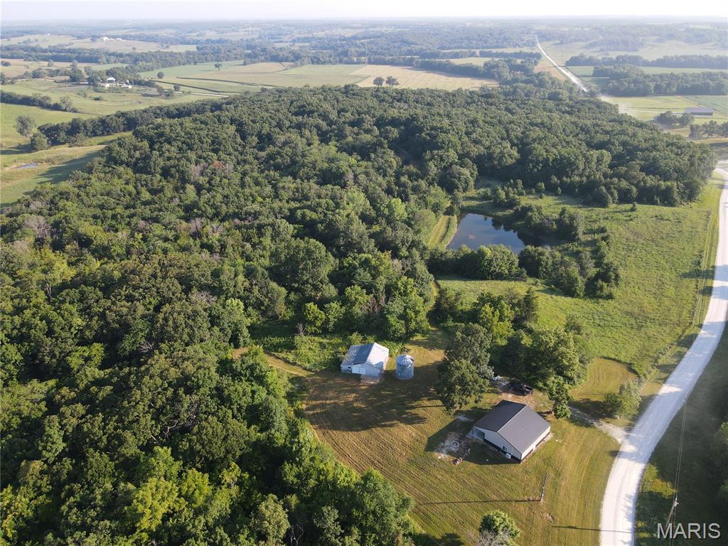 Turnkey 58+/- acre recreational property in Scotland County, Missouri, offering an exceptional combination of quality living and premier hunting. The 1,200 sq ft shouse, built in 2022, features 3 bedrooms and 2 bathrooms with modern finishes throughout — move-in ready with no updates needed.

Outdoor amenities include a half-acre stocked pond and an established food plot, both set up to support wildlife and outdoor enjoyment from day one. The property directly borders Indian Hills Conservation Area, providing excellent deer and turkey hunting with access to a larger connected habitat corridor.

A Ford 8N tractor with brush hog is included in the sale, giving the new owner immediate capability to maintain trails, food plots, and grounds.

This property is ideal for a full-time residence, weekend retreat, or investment hunting property — everything is in place and ready to enjoy immediately.

58+/- acres, Scotland County, MO
1,200 sq ft shouse (built 2022), 3 BR / 2 BA
0.5-acre stocked pond
Established food plot
Borders Indian Hills Conservation Area
Ford 8N tractor with brush hog included
Offered at $515,000