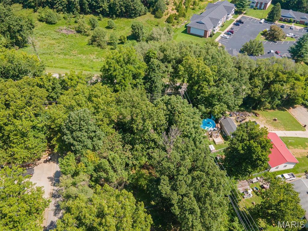 IDEAL BUILDING OPPORTUNITY!  Seize your opportunity to own lot 16 in Westwinds subdivision in Waynesville. With access to public water and sewer, ready for you to bring your vision to life. Embrace the convenience of being part of a well-established neighborhood while enjoying the flexibility of designing your perfect home. Don't miss out on this fantastic chance!
Lot 16 is located at the end of Pierre Avenue. No utilities have been established on these lots. Don't miss out on this fantastic chance!